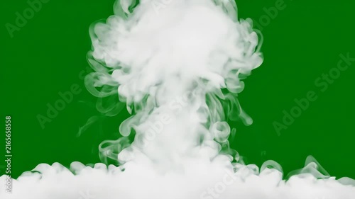 White smoke rising and swirling against a vibrant green screen background.