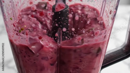 Healthy Berry Smoothie Being Blended in a Kitchen Blender.