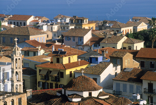 Nafplio features colorful buildings and rooftops with a view of the sea below in the Argolid region of Greece