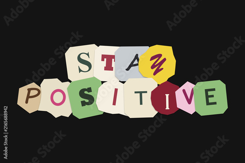 Konstfotografi Stay positive text made from colorful paper magazine cutouts on a dark backgroun