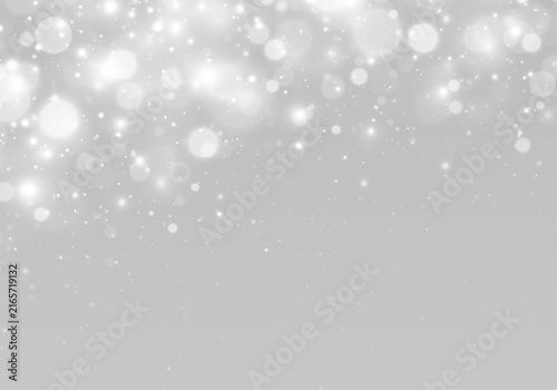 Bright bokeh lights with glitter particles and luminous sparkle.