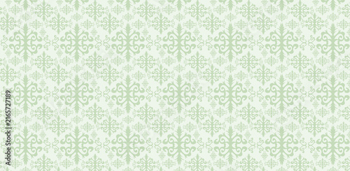 A seamless, light green damask pattern. The ornate design features intricate floral motifs and scrolling vine elements, creating a vintage and elegant feel