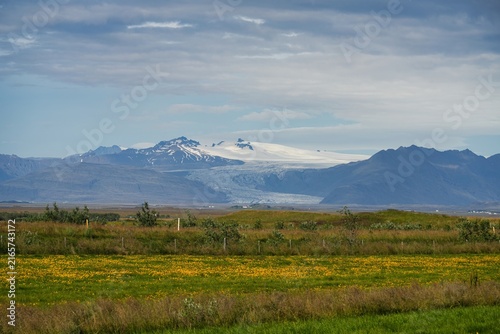 Photography Buildings with mountains in the background near the town of Hofn in Iceland