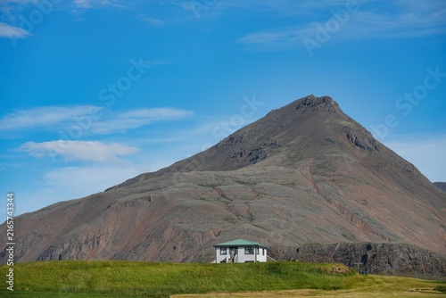 Photography Buildings with mountains in the background near the town of Hofn in Iceland