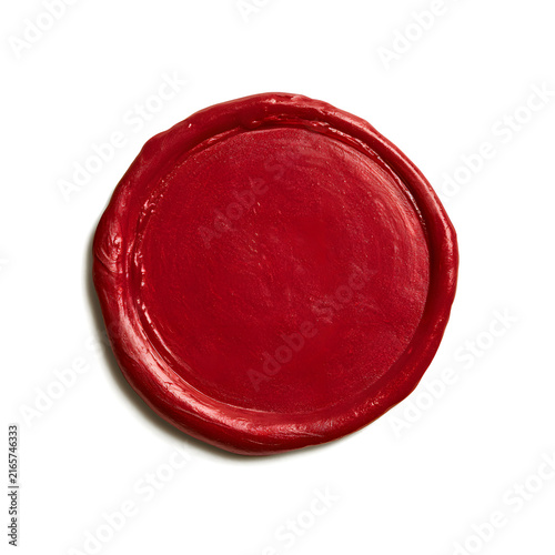 A vibrant red wax seal on a clean white background, exuding elegance and tradition.