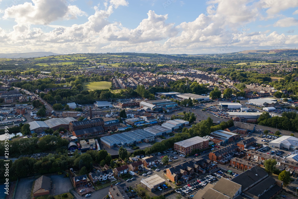 Fototapeta premium Aerial Image of Industrial Estates and Residential Suburbs in Bury