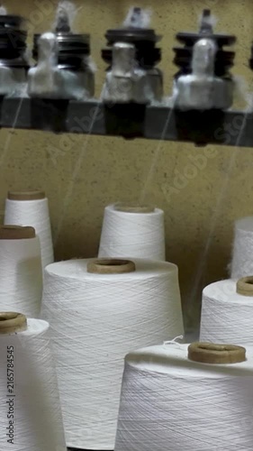 White Cotton Yarn Cones Close-up In Textile Mill