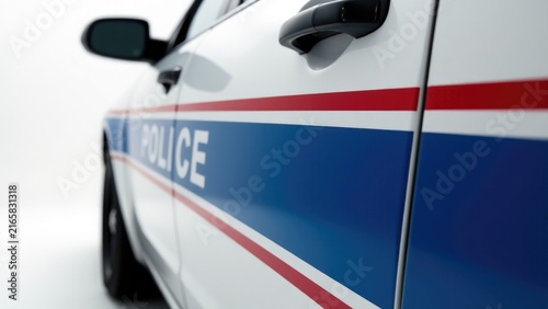 Police car with distinctive red, white and blue stripes, a symbol of law enforcement and safety