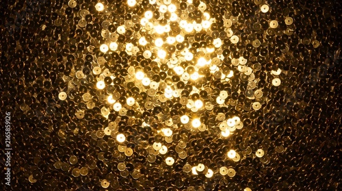 Golden Glitter Sparkles Bokeh Texture Glowing Festive Confetti on Black Background