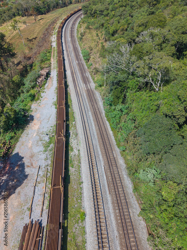 Aerial view of a cargo train and rail roads