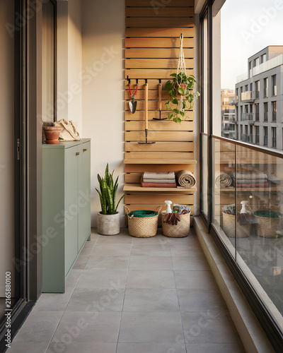 Modern Apartment Balcony Garden Storage Shelves With Potted Plants Tools Cabinet Wooden Slats Design