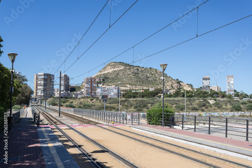 Modern Tram Station Platform with Mountain View in Spanish City