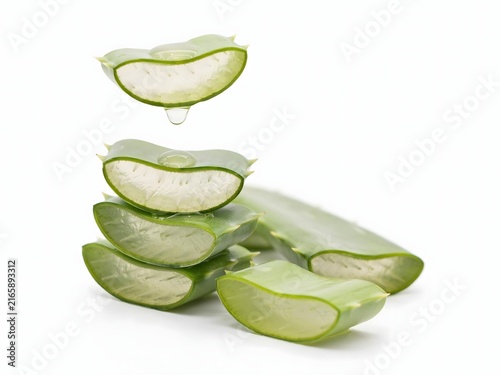 Fresh Aloe Vera Slices Falling in Midair for Skincare or Health Use