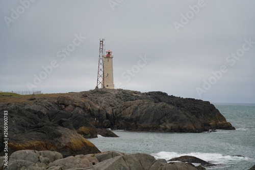 Obraz na plátně Stokksnes Lighthouse stands close to the spectacular Stokksnes beach and mountains