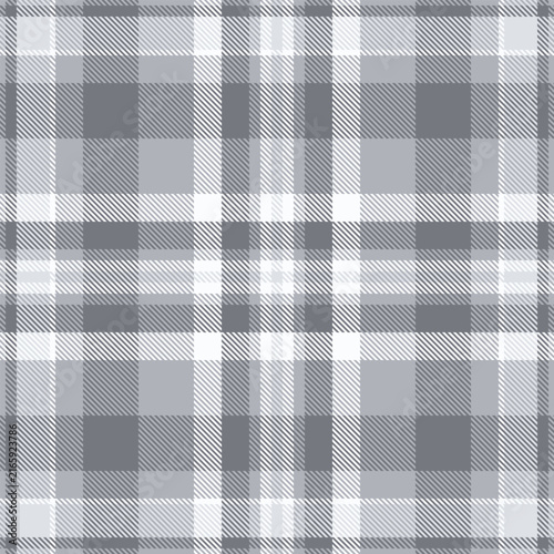 Traditional tartan plaid pattern with a textured woven appearance and antique steel and gray quill tones. The seamless fabric design creates a calm decorative background. for creative surface design.