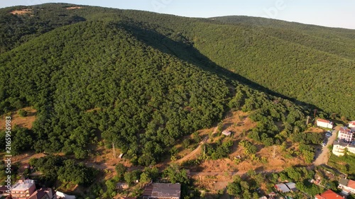Panoramic aerial view of mountains, houses and hotels of Sveti Vlas in Bulgaria from above, top view from drone. Summer holiday in Europe. 
