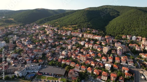 Panoramic aerial view of houses and hotels, near mountains, sea and beaches of Sveti Vlas in Bulgaria from above, top view from drone. Summer holiday in Europe. 
