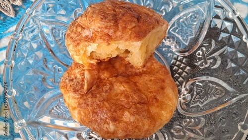 фотографія Golden flaky pastry rests inside an elegant vintage crystal serving bowl