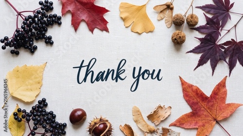 Thank you message displayed elegantly with a colorful border of autumn leaves, dried seed pods, berries, and chestnuts arranged artistically on a neutral textured fabric background