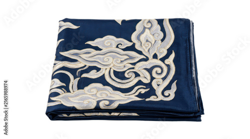 Folded blue silk batik fabric decorated white cloud patterns studio shot isolated white background commercial textile product