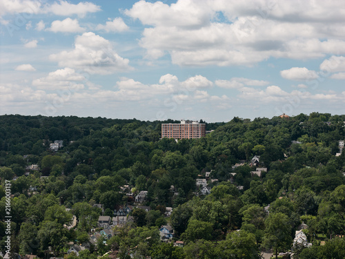 Downtown White Plains skyline above tree-filled neighborhoods in Westchester County, New York
