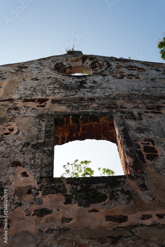 Obraz na plátně Close Up of Weathered Ancient Church Ruin Wall Empty Stone Window Opening