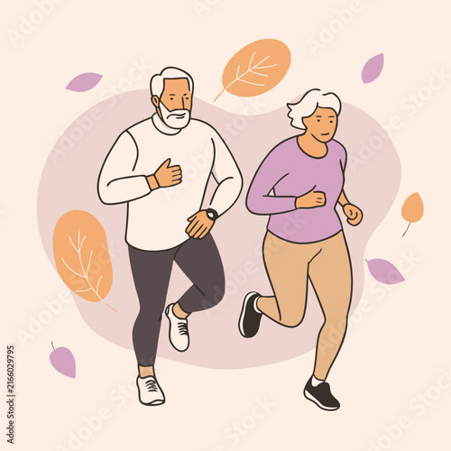 Senior couple jogging together outdoors in autumn park with falling leaves and active lifestyle concept