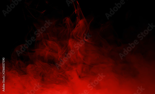 Abstract red smoke and fiery vapor swirling over a black background creating a dramatic atmospheric texture for backgrounds posters motion graphics energy mystery fantasy and creative design work only