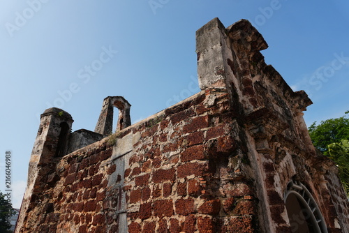 Fotografie Low Angle Exterior View of Ancient Red Stone Fort Ruins, Portuguese Heritage Mal