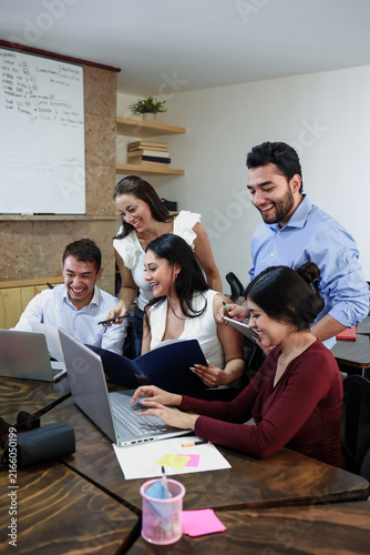 Latin business teamwork with diverse men and women working at office in Mexico Latin America. Portrait of hispanic big group of people employees in a company or workplace