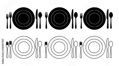 Dining utensils and plates set with flat lay arrangement featuring fork, knife, spoon, and plate with glass and napkin and dining table background