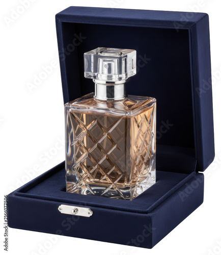 Luxury glass perfume bottle in navy blue velvet gift box with transparent backdrop