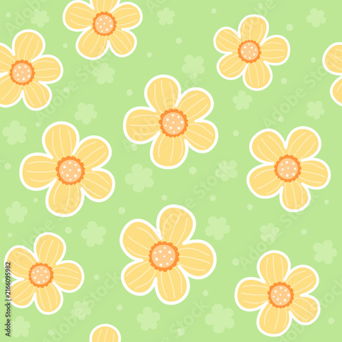 Playful seamless pattern with yellow doodle flowers and tiny floral details on a light green background. A cheerful cute design ideal for fabric print