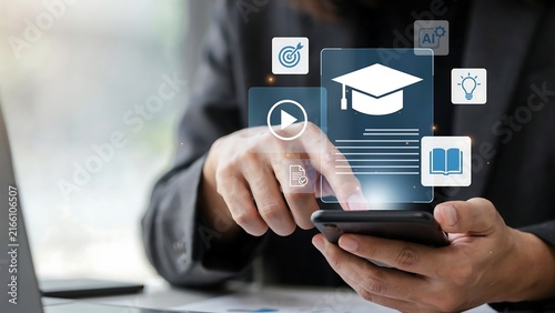 A business person utilizes a mobile device to access digital education and professional online learning resources through an interactive interface