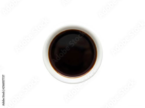 Top view of a small white bowl filled with soy sauce isolated on transparent background