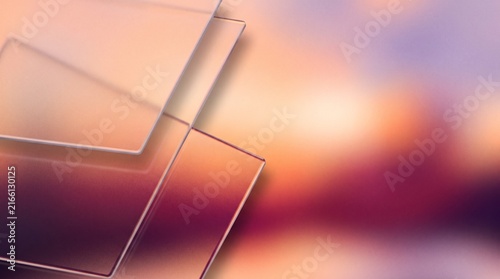 Modern glassmorphism background with floating translucent frosted glass panels over warm sunset grainy gradient