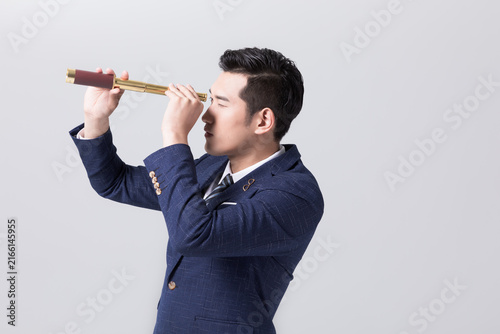 Obraz na płótnie Businessman Looking Through Telescope