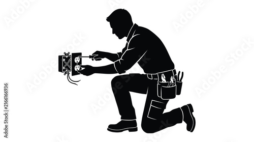 Electrician kneeling and wiring an electrical box black silhouette