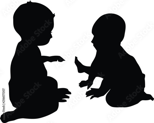 Black silhouette of two small babies sitting on the floor and playing together, isolated on a white background, showing the interaction and curiosity of young children