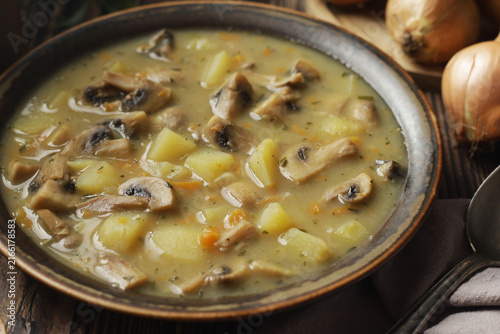 A bowl with traditional Czech mushroom Bramboracka soup