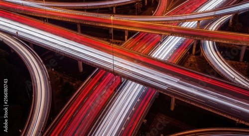 Obraz na płótnie Long Exposure Night Traffic Light Trails on Complex Urban Highway Interchange and Overpass System
