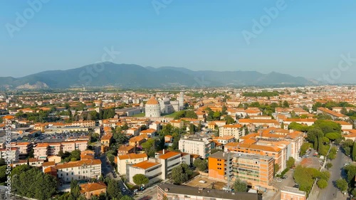 Pisa, Italy. The famous Leaning Tower and Pisa Cathedral in Piazza dei Miracoli. Summer. Evening hours. Drone footage