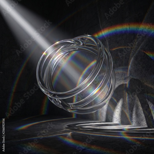 Rainbow Refraction Through Floating Glass Rings on Dark Background