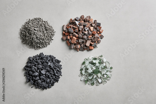 Construction aggregate samples arranged for material comparison