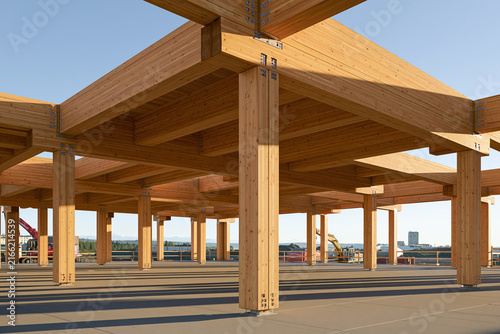 Mass timber office structure under construction with exposed frame