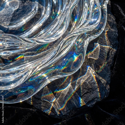 Refracted Rainbow Light Passing Through Glass Waves
