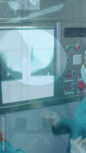 About surgeons and nurses looking at an x-ray at the hospital