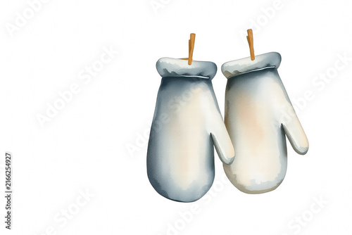 Pair of white winter mittens hanging on clotheslines