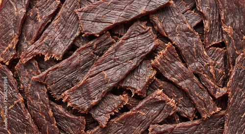Rough Dark Beef Jerky Strips Showing a Dense Dehydrated Meat Texture