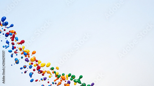 Liquid Paint Droplets Frozen in Air, Vivid Splash Studio Background with Copy Space for Text